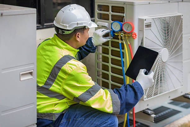 Professional Hvac technician working in Wells, MN